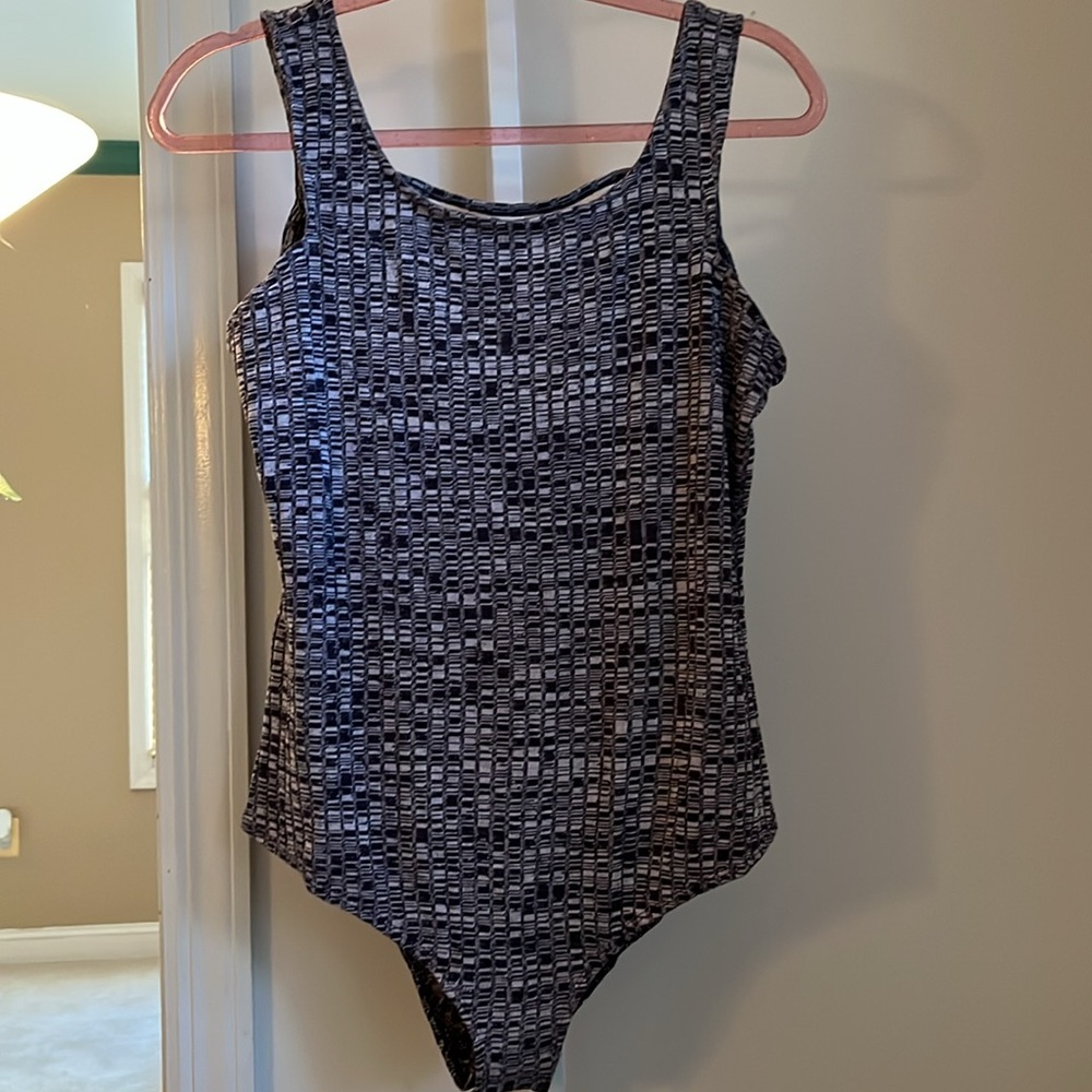 URBAN GIRL BODYSUIT. NWT. SIZE LARGE.